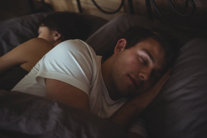 couple sleeping peacefully bed deep sleep natural melatonin restorative rest organic sleep aid